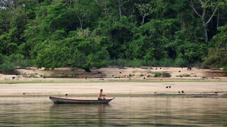 Boats of Brazil, Amazon River, fisherman. Copyright © Don's Art